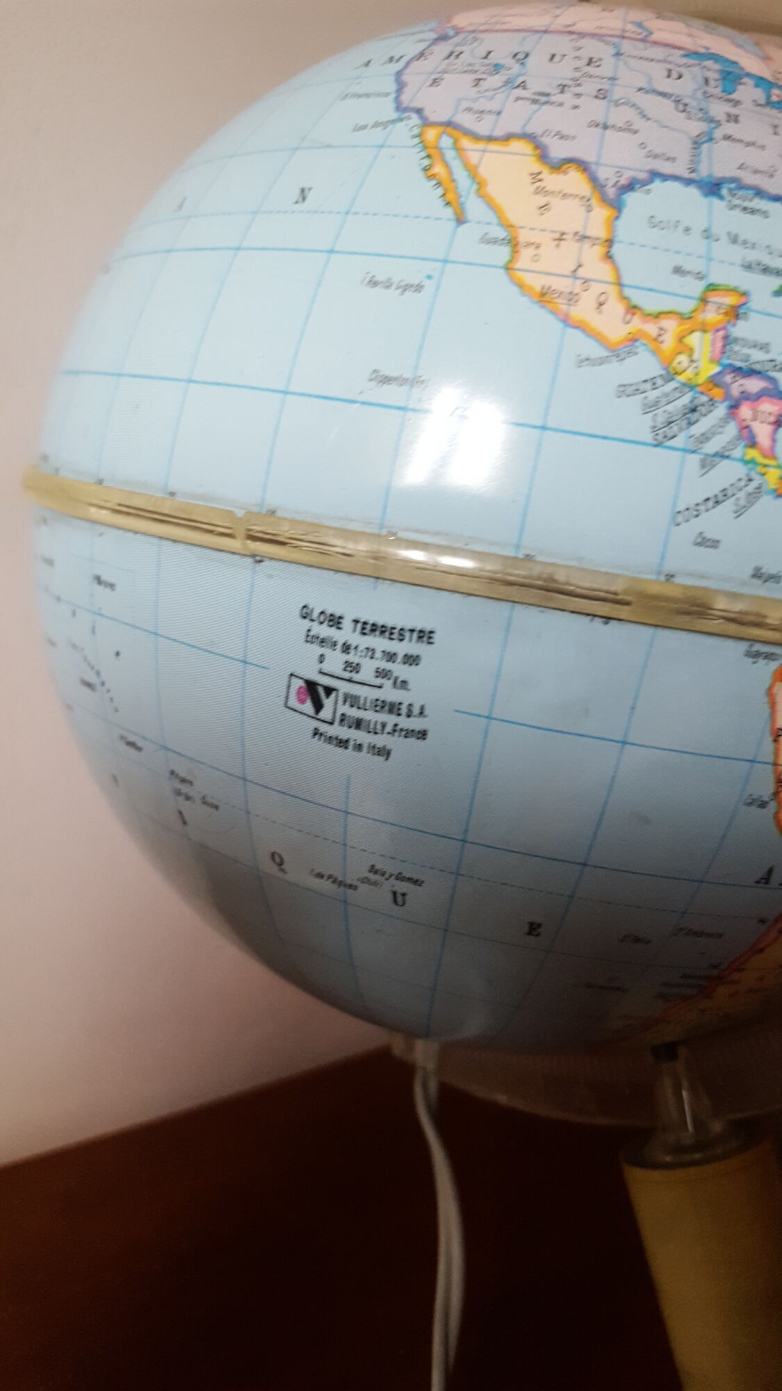 Bright vintage Earth globe brand Vulliermes with metal tripod foot