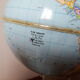 Bright vintage Earth globe brand Vulliermes with metal tripod foot