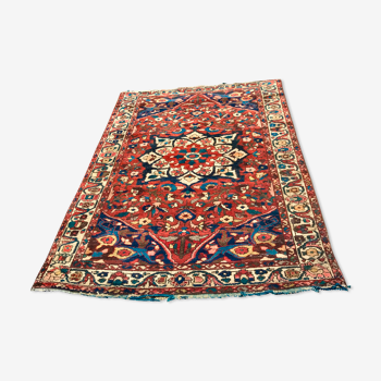 Ancient Iranian hand-knotted wool carpet,140x202 cm