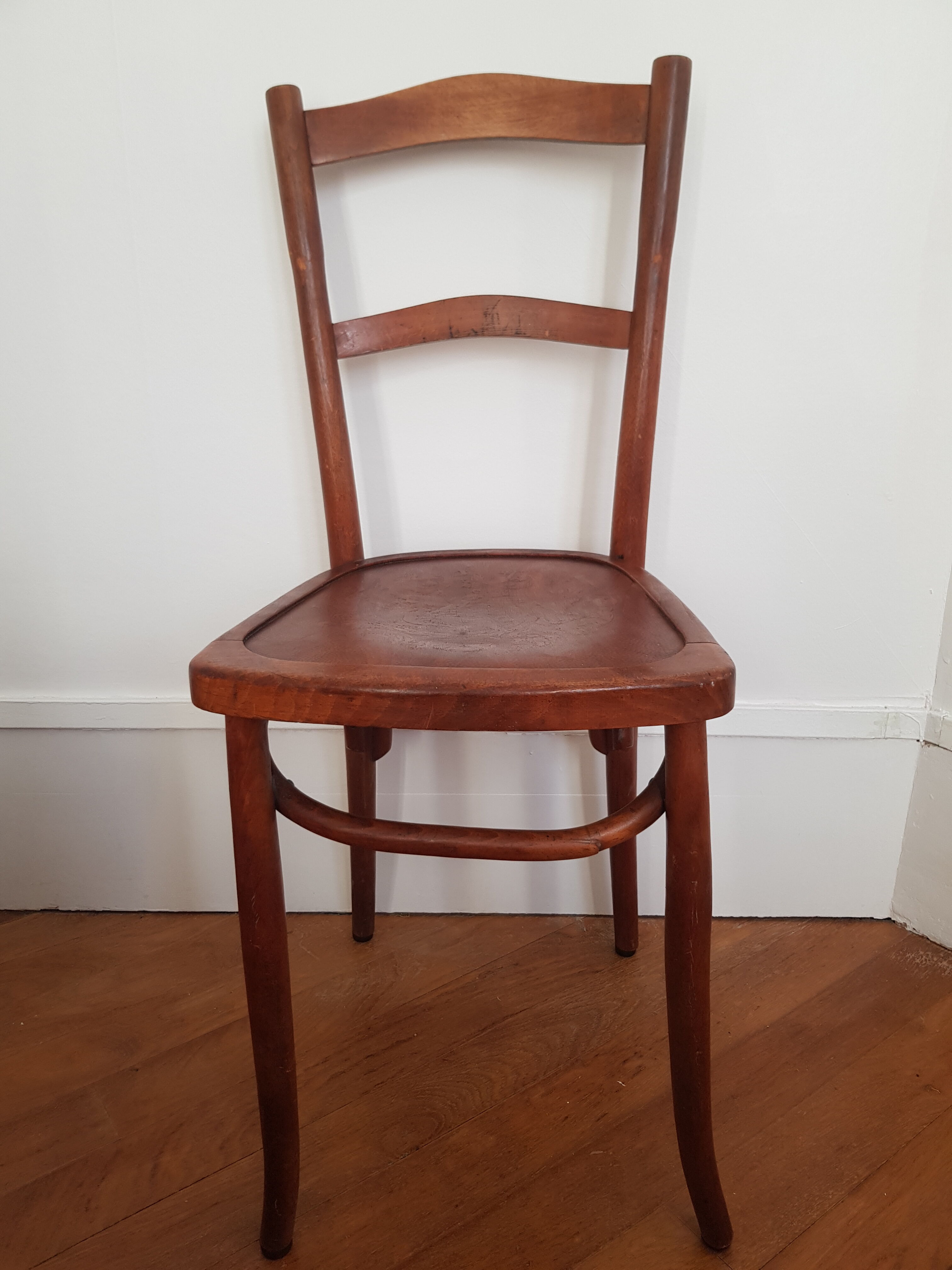 Curved wooden bistro chair