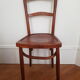 Curved wooden bistro chair