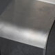Set of 6 dining chairs in bent aluminum, 1980’s