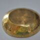 Empty hammered brass pocket