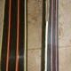 Old skis wooden and its pair of sticks