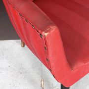 Mid-century modern pair of red armchairs. italy 1950s