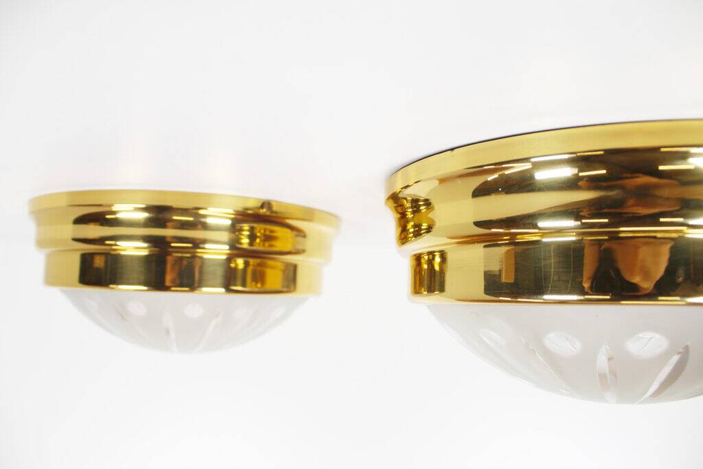 Pair of vintage brass ceiling lights with glass globe