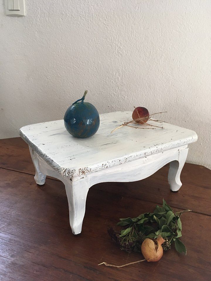 Former foot, skated in white wooden rest