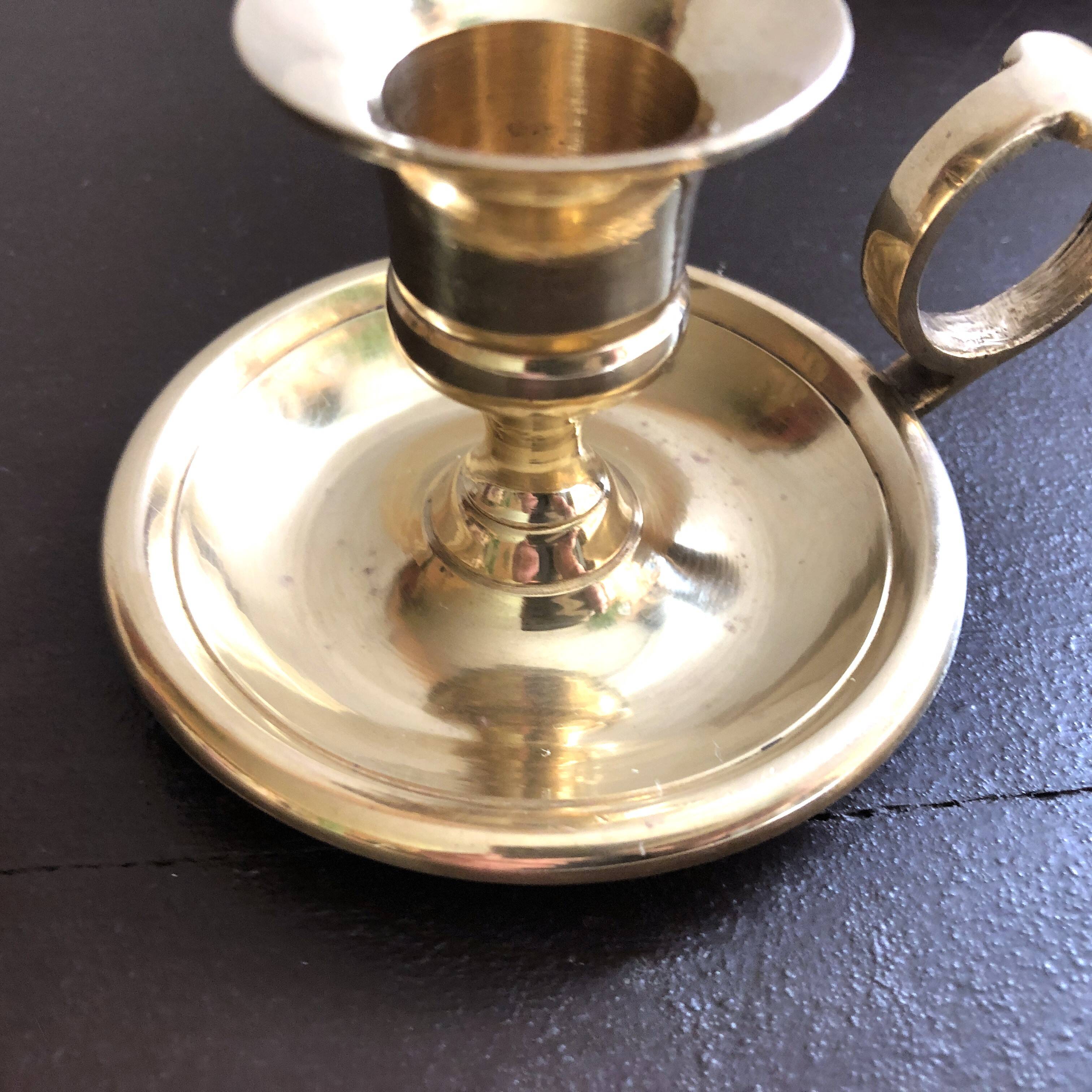 Hand candle holder called "Cave Rat" vintage golden brass