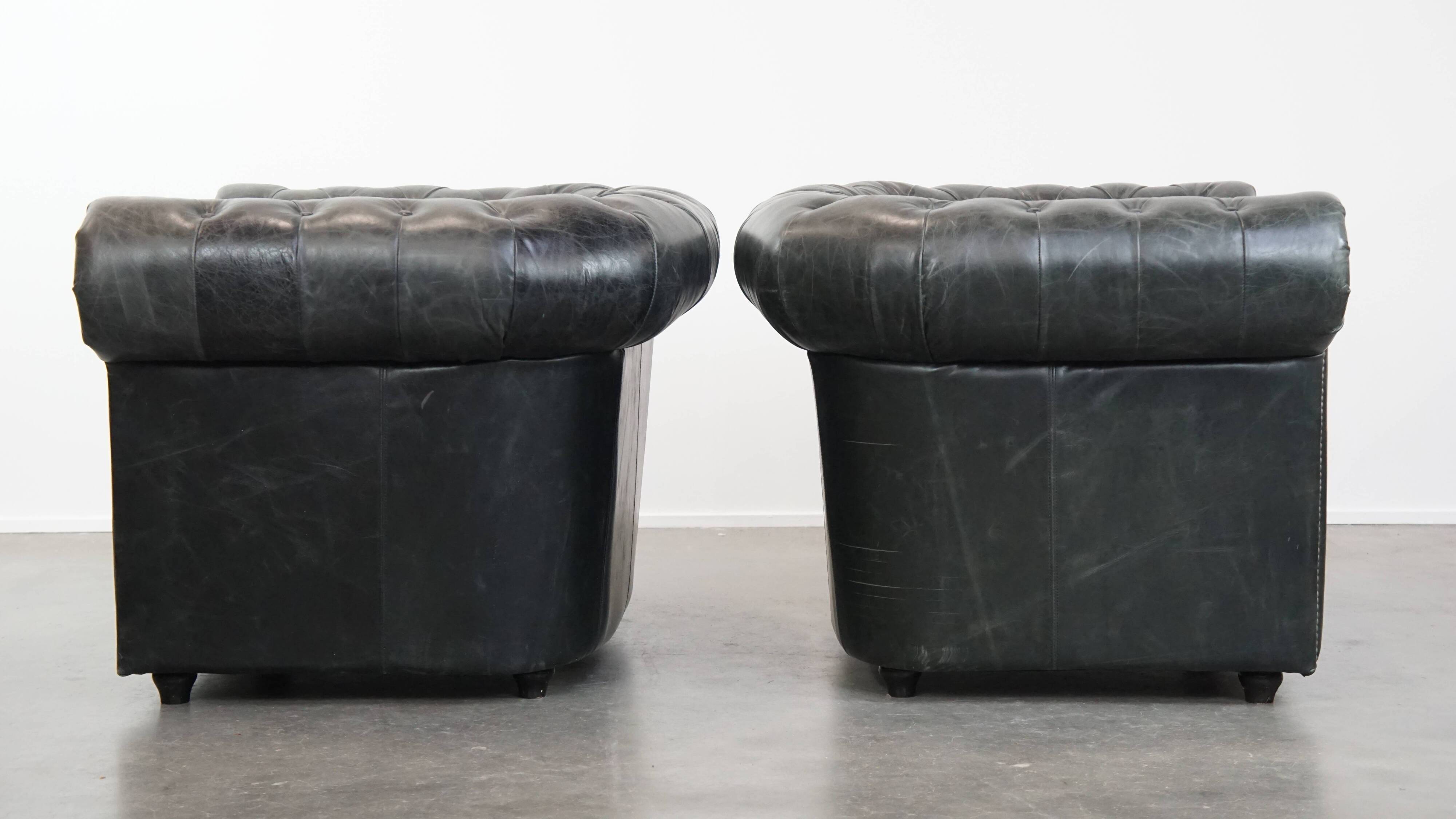 Set of 2 black Chesterfield armchairs in grained cowhide leather