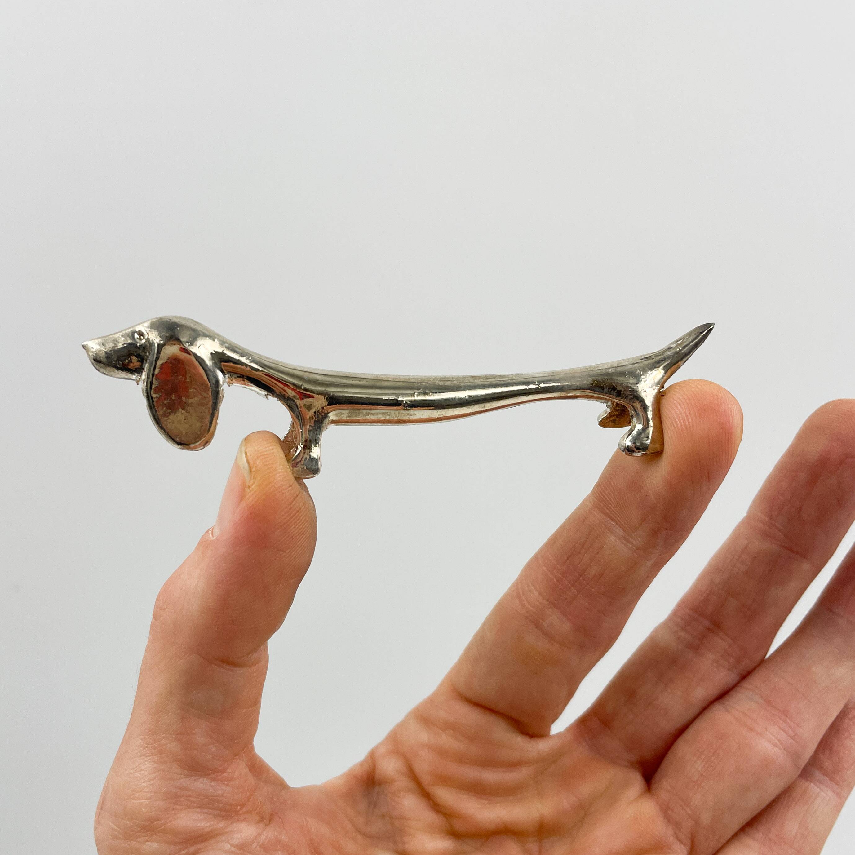 Set of 6 silver metal Dachshund knife holders, 1970s
