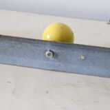 Wall-mounted coat rack, metal and colored wooden hook, 1960