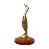 Vintage brass cormoran on base