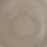Flowery bowl with blue edging.