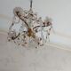 Chandelier to, colored crystal tassels