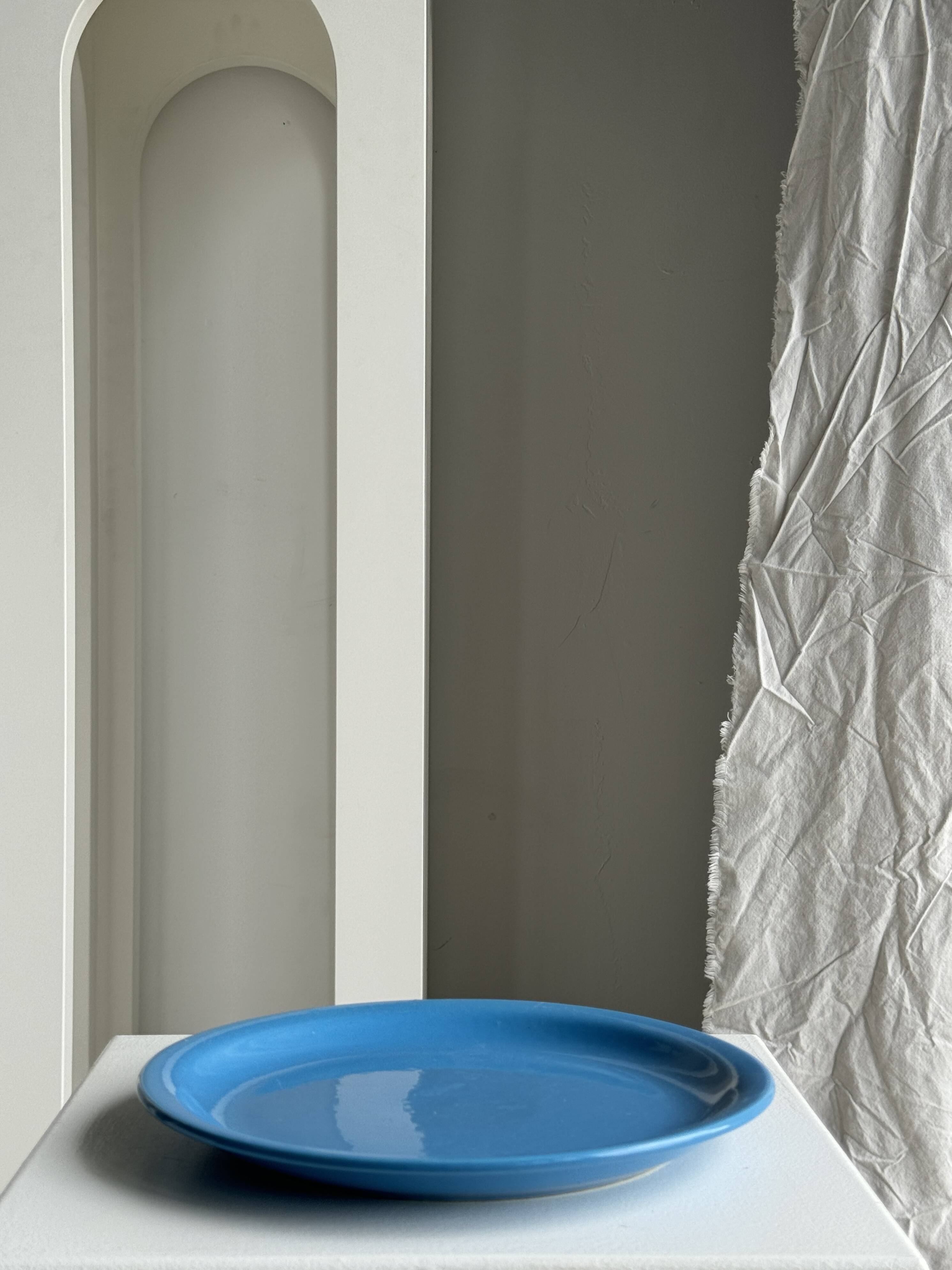 Set of 2 sky blue plates, one slotted