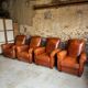 Lot de 4 fauteuils club, Cognac