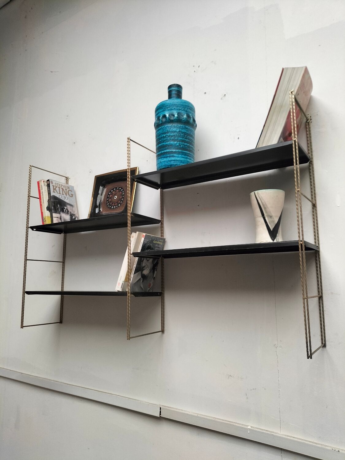 Metal wall shelf