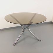 Vintage round dining table in smoked glass and chromed metal, Space Age style, from the 70s