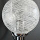 Chrome wall light with blown glass from the 1970s.