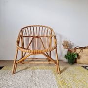 Fauteuil corbeille vintage en rotin – années 60