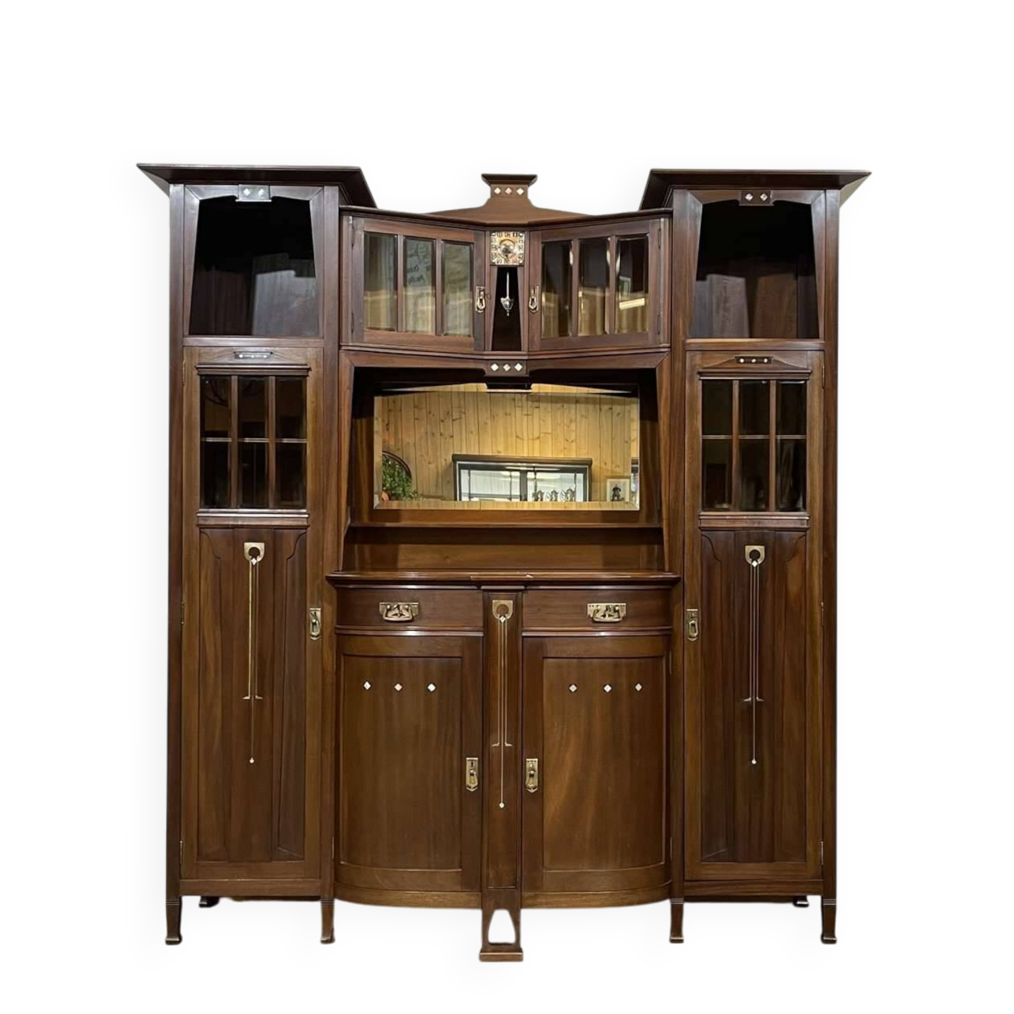 Art Nouveau mahogany buffet with clock in the style of G. Serrurier Bovy.