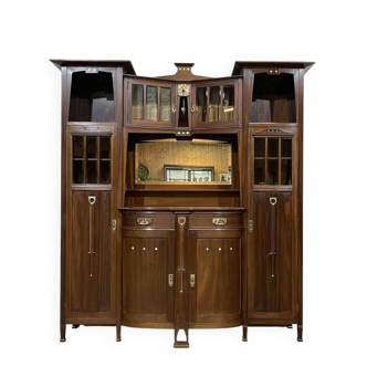 Art Nouveau mahogany buffet with clock in the style of G. Serrurier Bovy.