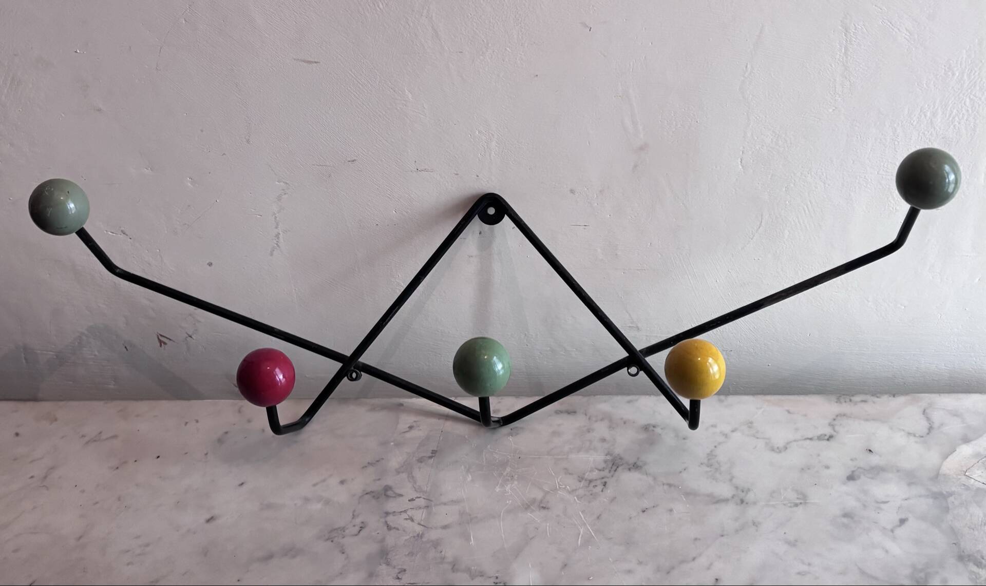 Wall coat rack Roger Feraud, metal and wooden balls.