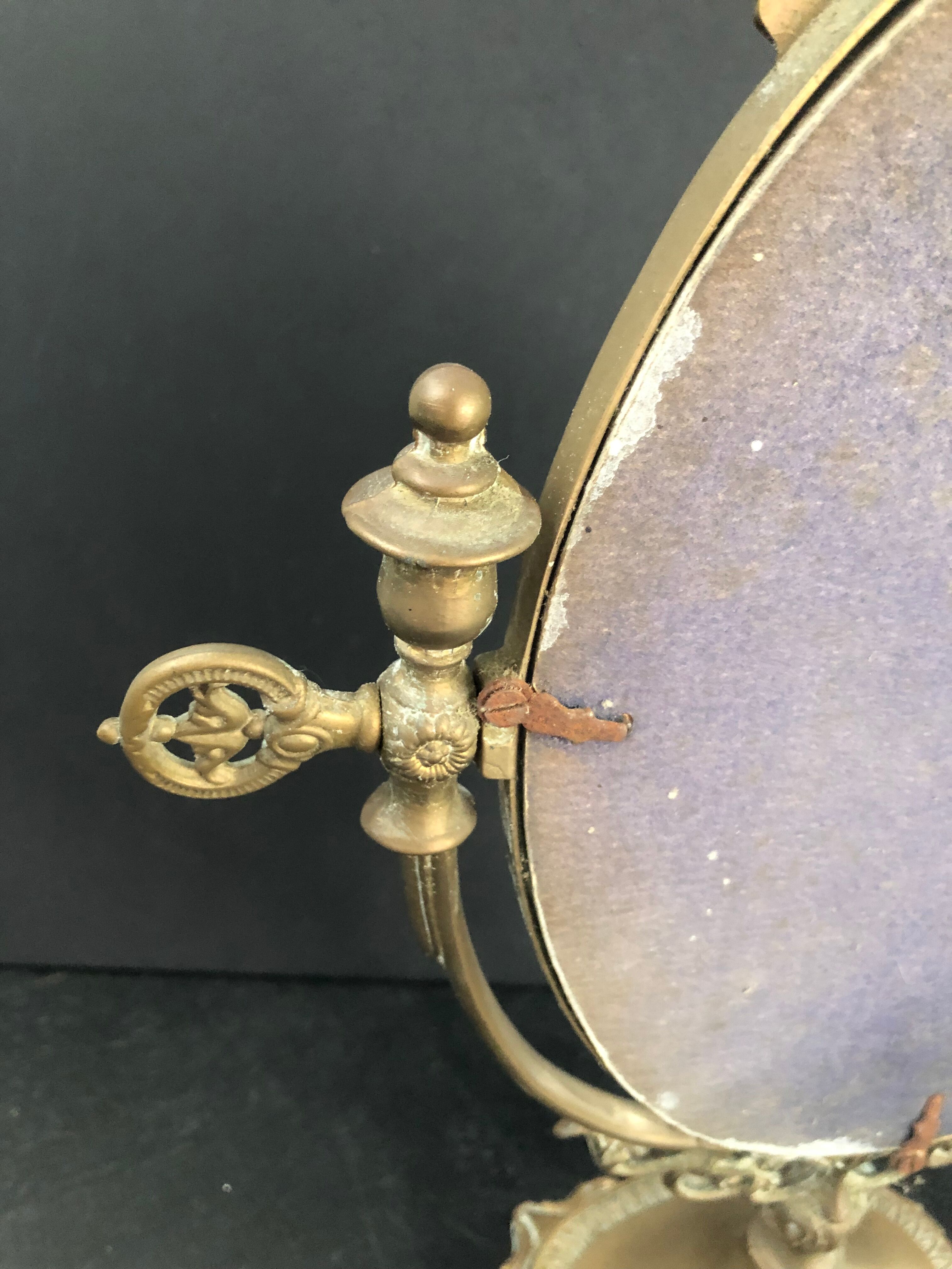 Swivel bronze mirror