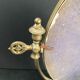 Miroir en bronze pivotant