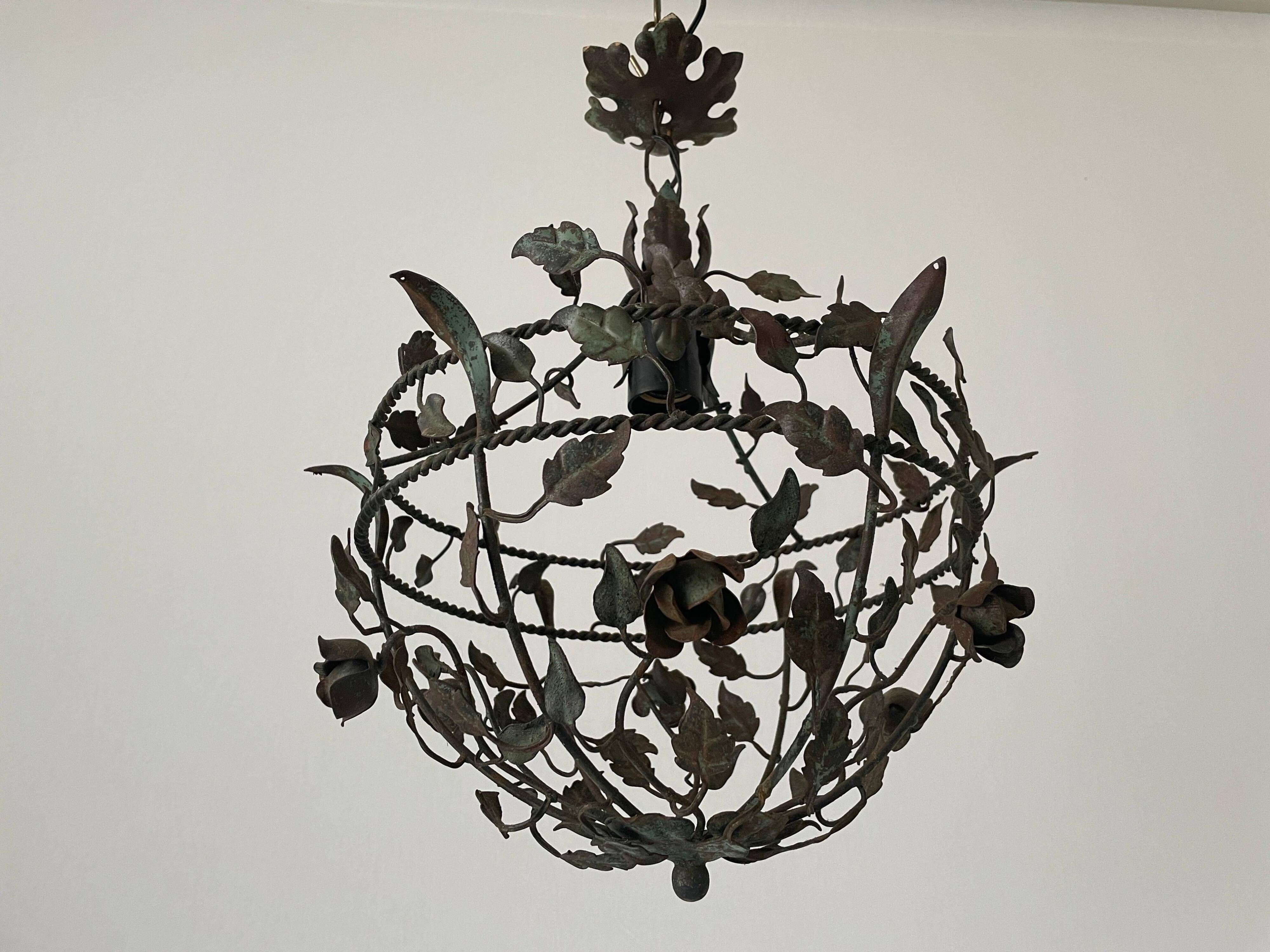 Patinated metal ceiling light with a floral and leaf pattern, 1950s, Italy.
