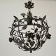Patinated metal ceiling light with a floral and leaf pattern, 1950s, Italy.