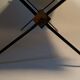Coffee table in gilded brass, black metal and black opaline top, circa 1950