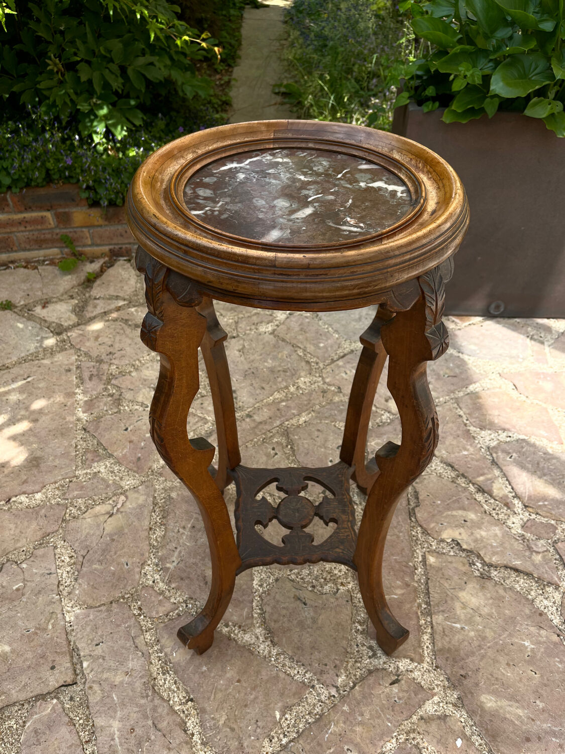 Old harness in wood with marble top