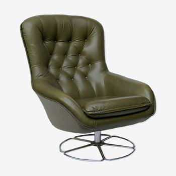 Swivel armchair in olive green leather 1970s