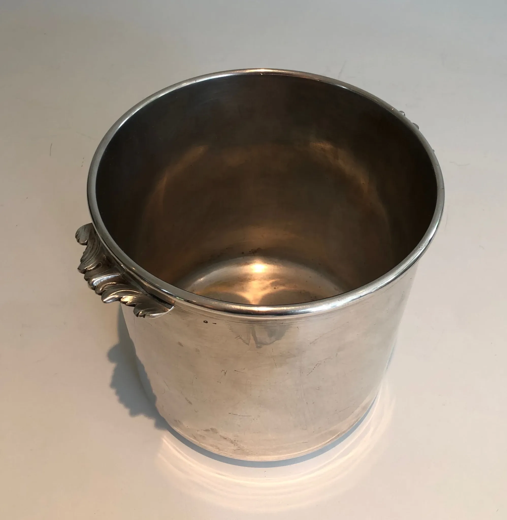 Cylindrical Silver-Plated Champagne Bucket with Small Leaf-Shaped Handles.