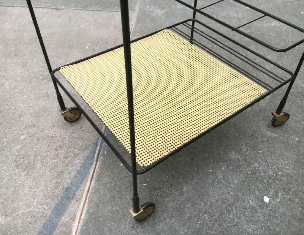 Minimalist perforated metal serving trolley in mid-century style, 1960s.