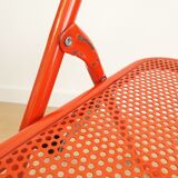 Perforated metal folding chair