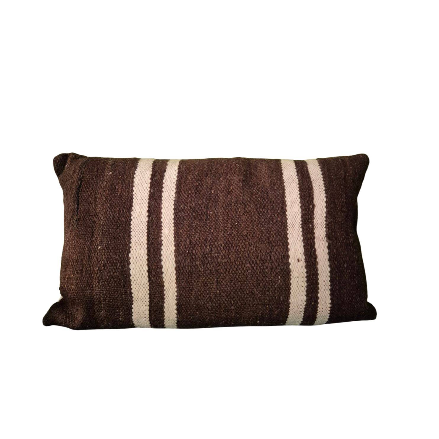 Cushion cover in old Berber blanket.