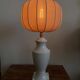 White ceramic table lamp with pastel shade