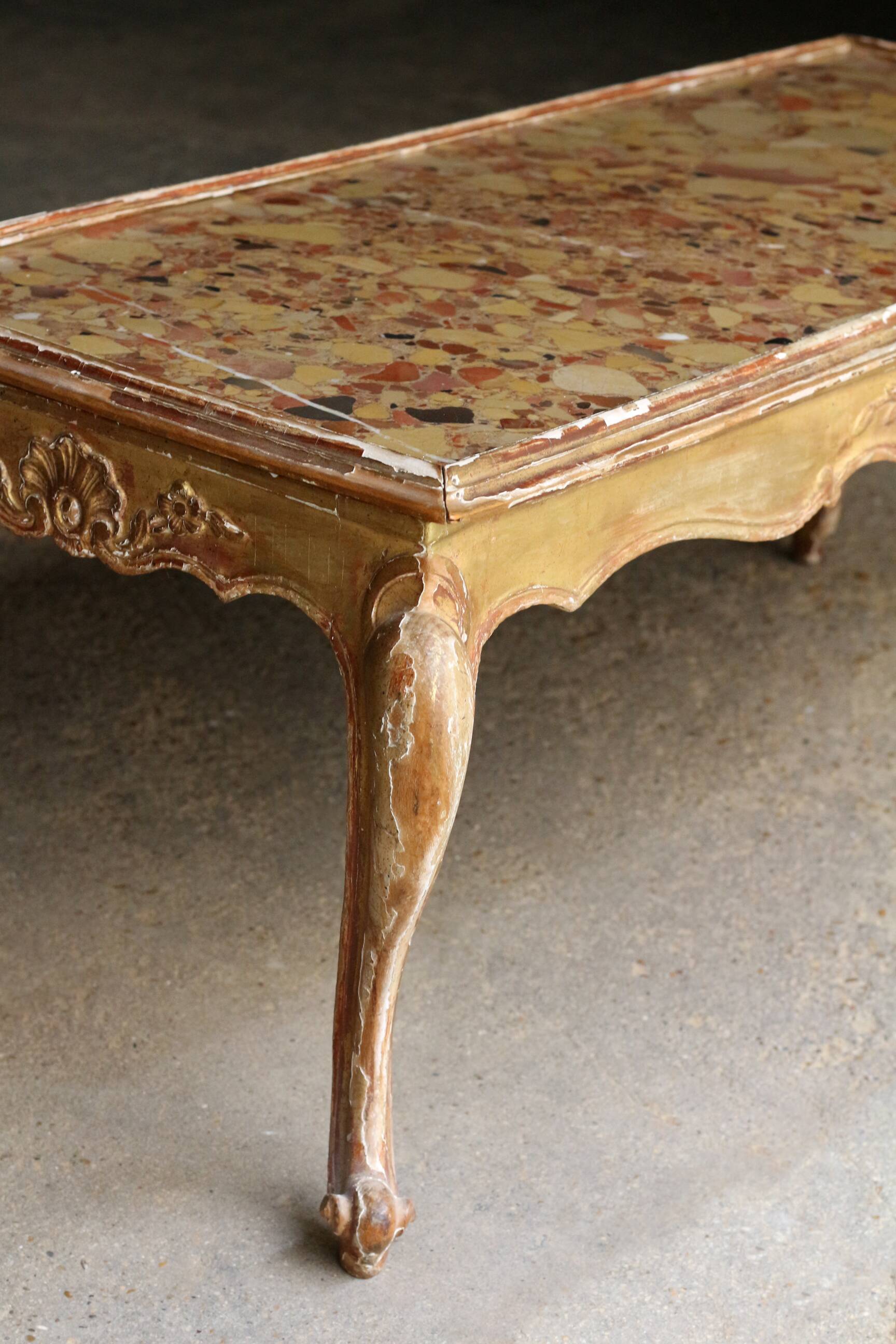 19th century coffee table. Gilded stucco and marble.