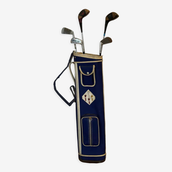 Golf bag filled with 5 vintage clubs