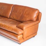 Vintage three-seater leather sofa. Edition by Roche Bobois. France, 70s-80s