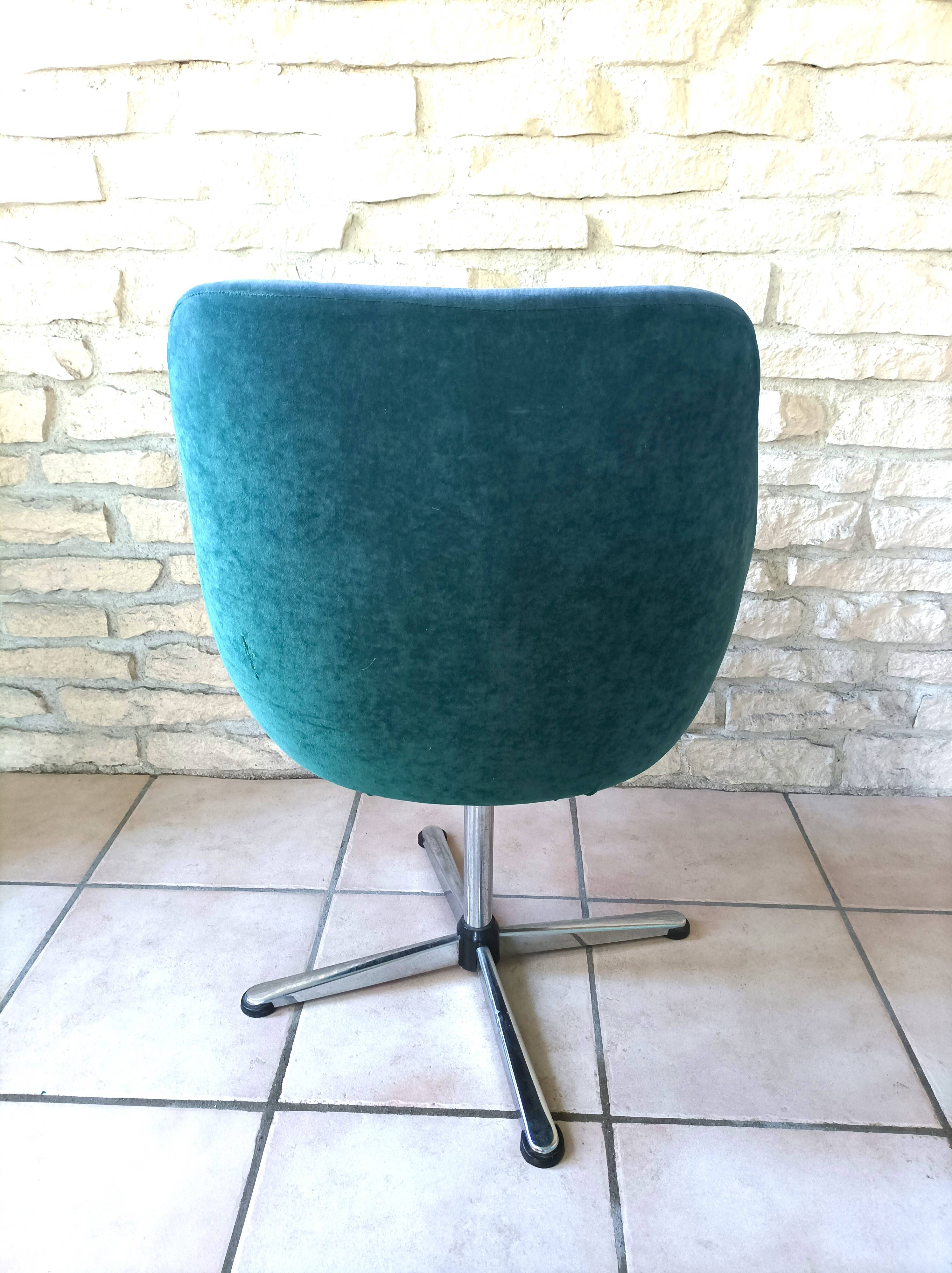 Green velvet armchair