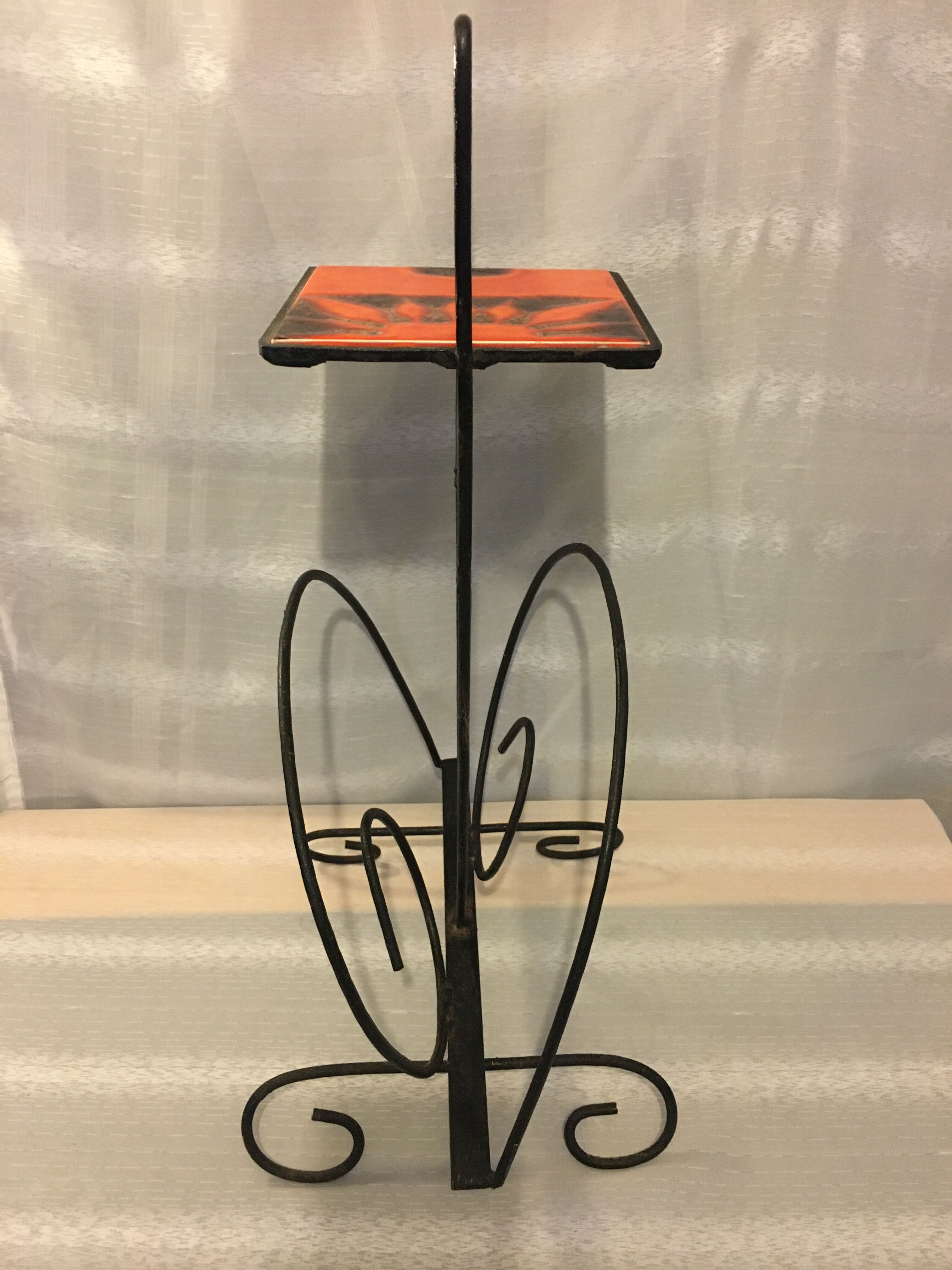 Wrought iron newspaper holder