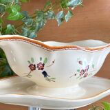 Large antique sauceboat in Longchamp earthenware.