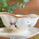 Large antique sauceboat in Longchamp earthenware.
