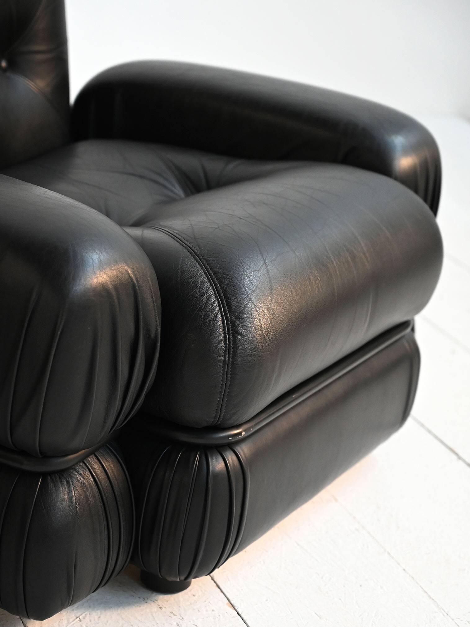 Black leather and tubular steel armchairs, 1970s