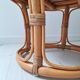 Rattan and terry fabric pouf