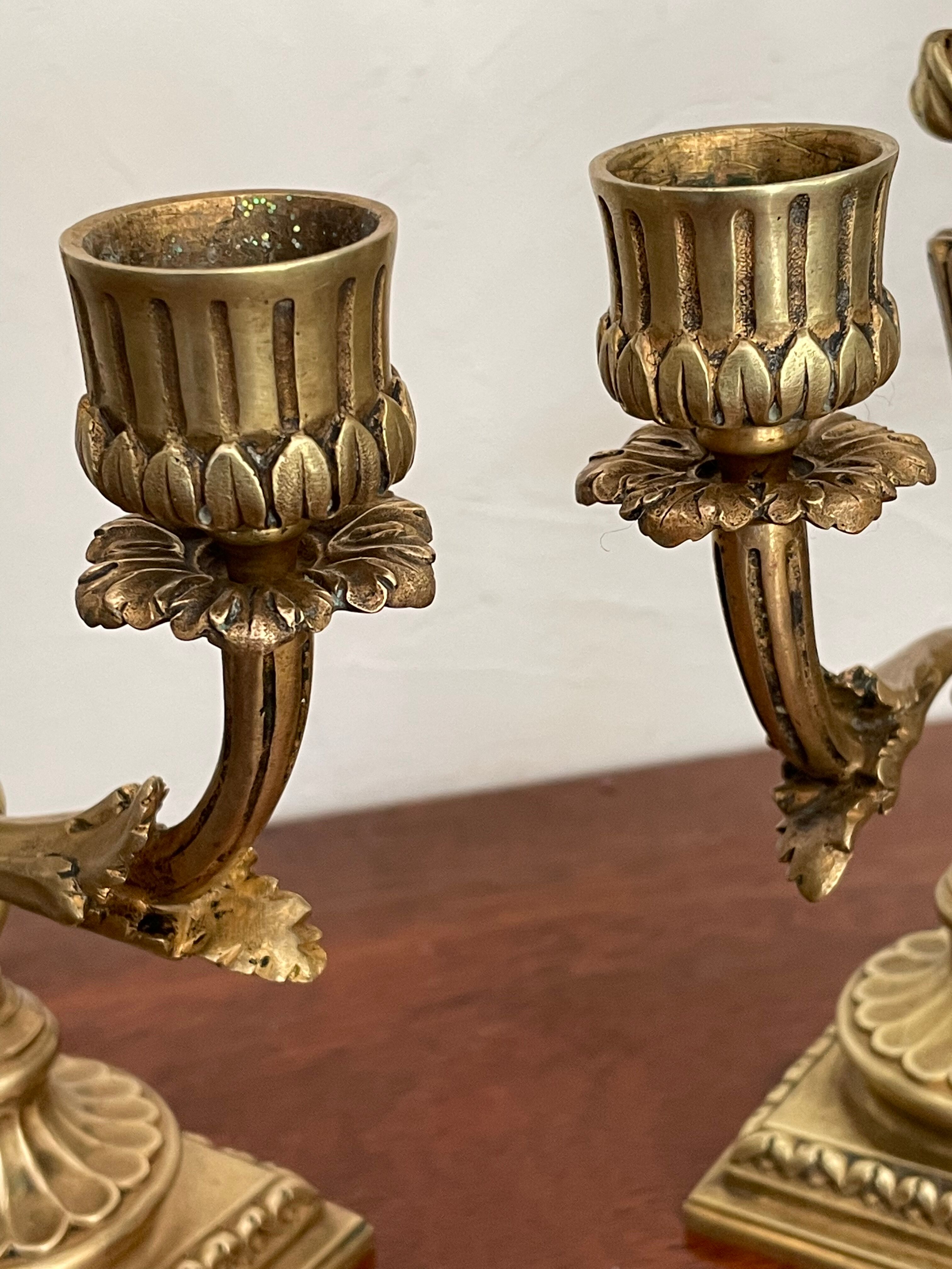 Pair of candle holders in gilded bronze nineteenth century