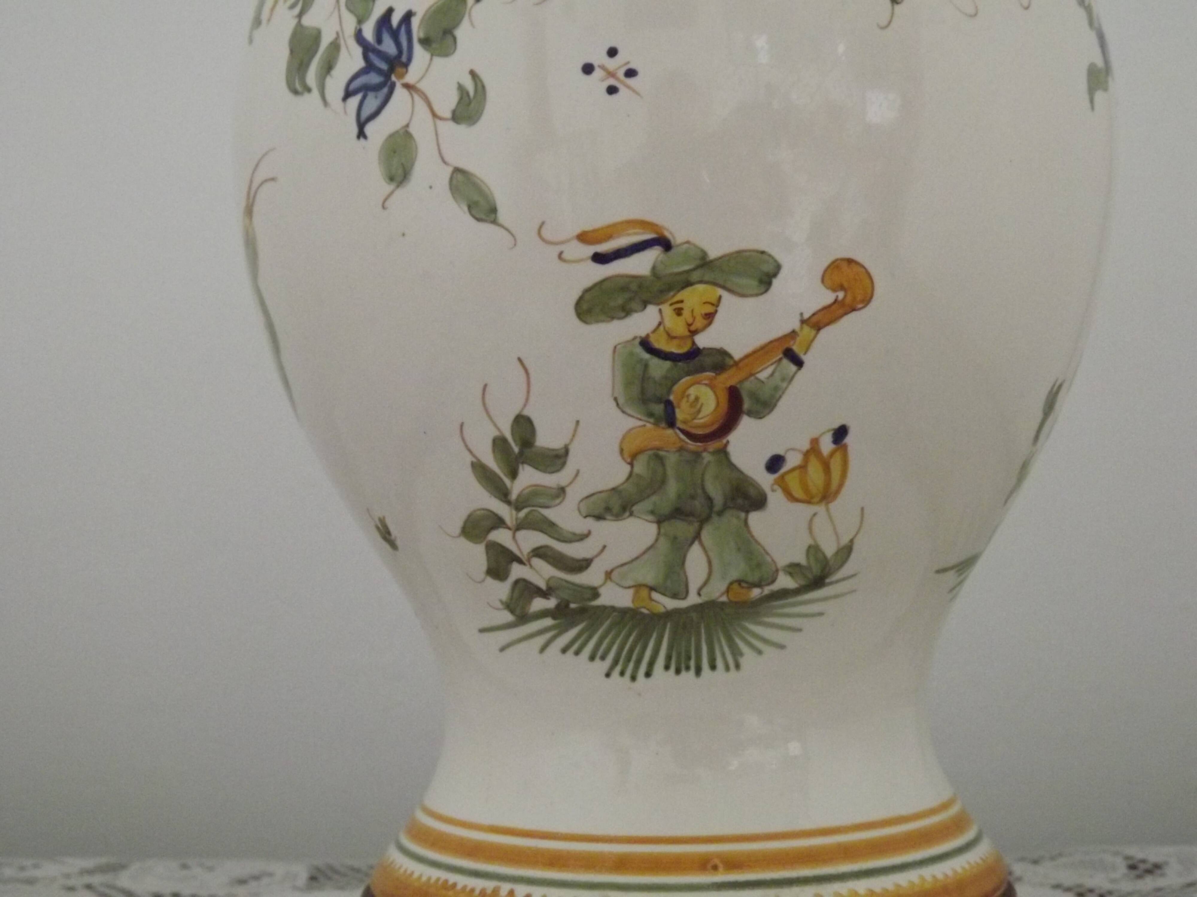 Table lamp with wooden base and fringed shade